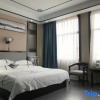 Отель Xinhai Hotel Zhecheng, фото 3