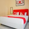 Отель OYO 2202 Delima Guest House Syariah, фото 3