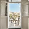 Отель Vintage Charm 1BR Apt w Balcony & View, фото 14
