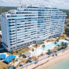Отель Escape To Paradise Beachfront 2br Beach, фото 21