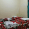 Отель OYO Homes 91083 Desa Wisata Plosokuning Syariah, фото 10