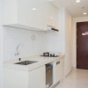 Отель Nice And Homey Studio Room At Sky House Bsd Apartment, фото 4