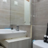 Отель Homey and Comfy 3BR at Bassura City Apartment, фото 11