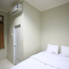 Отель RedDoorz Karet Pedurenan, фото 2