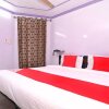 Отель Dr Guest House By OYO Rooms, фото 4