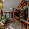 Отель Tengchong Heshun Siqixiaoshu Kezhan, фото 9