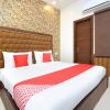 Отель OYO Flagship 29074 Golden Temple Road, фото 4