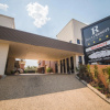 Отель Rocky Resort Motor Inn, фото 1