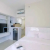 Отель Nice And Comfy Studio At Springlake Summarecon Apartment, фото 18
