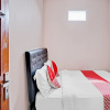 Отель OYO 90234 Dhoho Family Guest House, фото 1