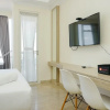 Отель Cozy and Furnished Studio at Menteng Park Apartment, фото 4