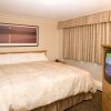 Отель Woodlands Inn & Suites, фото 3
