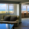 Отель Sunrise Penthouse Muizenberg Beach, фото 7