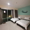 Отель Rustic one bedroom unit for 4 pax with Sea View by JoMy Homestay, фото 3