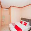 Отель OYO 1349 Amira Homestay Syariah, фото 12