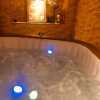 Отель La suite inoubliable Avec jacuzzi, фото 24