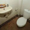 Отель OYO 93021 Kost Dison, фото 9