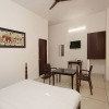 Отель OYO 9723 Home Farm Stay Connaught Palace, фото 9