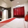 Отель OYO 12844 Sri Sai Suites, фото 10