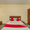 Отель OYO 26565 Rajatha Mahal, фото 7