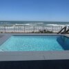 Отель Serenity by the Sea - 4 Bedroom 4 Bath - Oceanfront Pool Home, фото 16