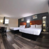 Отель Moonlight Inn and Suites, фото 12