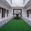 Отель OYO 2587 Enfaza Guesthouse Syariah, фото 2