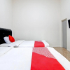 Отель Guest House 513 Syariah By OYO, фото 14