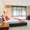 Отель OYO 154 Griya Patria Guest House, фото 6