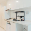 Отель Comfortable And Homey Studio At Sky House Alam Sutera Apartment, фото 9