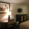 Отель Travelers Inn & Suites, фото 6
