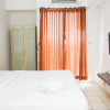 Отель Cozy And Simply Studio At Serpong Greenview Apartment, фото 2