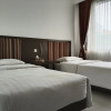 Отель Twin Guest House Grand Wisata, фото 7