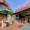 Отель Super OYO Capital O 90497 Navaya Guest House, фото 9