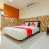 Отель OYO 2580 Hotel Puri Royan, фото 6