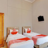 Отель OYO 92924 Kalista Guest House Syariah, фото 3