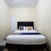 Отель Tiga Mas Inn by OYO Rooms, фото 23