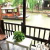 Отель Wuzhen Dongzha Linshui Homestay, фото 15