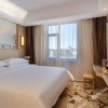 Отель Vienna 3 Best Hotel (Tianjin Dagang Wanda Plaza), фото 8
