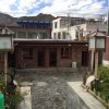 Отель Yangkor Tibetan Homestay - Hostel, фото 1