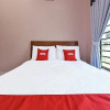 Отель OYO Home 90448 Nurbayu Guest House, фото 8