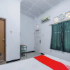 Отель OYO 93976 Maluku Guest House, фото 3