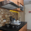 Отель Cozy Living Studio at Springlake Summarecon Bekasi Apartment, фото 6