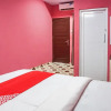 Отель OYO 93342 Yasmine Guesthouse Syariah, фото 4