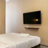 Отель Stunning And Comfy 2Br + Study Room At Sudirman Suites Apartment, фото 2