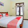 Отель OYO 2864 Mangsit Garden Homestay, фото 10