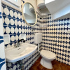 Отель Colorful and Stylish Villa With Shared Pool and Private Garden by Beahostrentals, фото 4