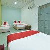 Отель OYO 90736 Lh Resak Motel, фото 5