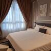 Отель Zulanie Suite at Troika Residence, Cozy & Comfort, Free Wifi & Netflix, фото 5