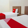 Отель OYO 709 Menjangan Residence at Klayatan, фото 22